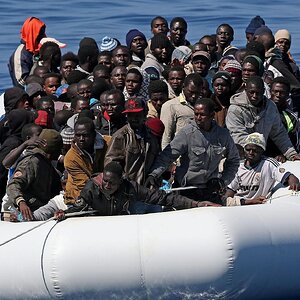 The mature slut wife and boat loads of Asylum seekers.jpg