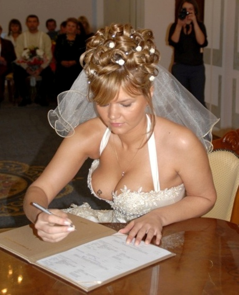 Me signing my wedding day agreement .jpg